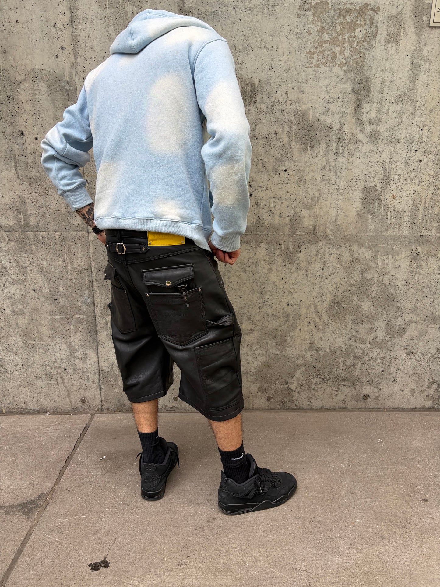 'Running Man' Waxed Leather Shorts